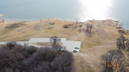 Top view large parking lots near woody park and lakeside picnic area at Grapevine Lake, Texas,...