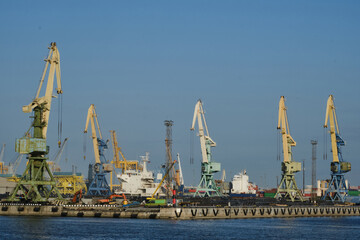 Cargo port cranes in St. Petersburg. Logistic and transportation concept. Cargo harbour for...