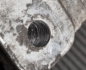 Bad internal threads in aluminum automotive parts. Thread repair, macro
