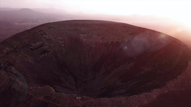 Volcano crater aerial shot at sunset - Canary Islands - Fuerteventura