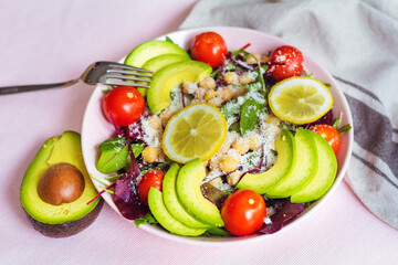 Avocado Salad with Arugula ,Cherry Tomatoes , Baby Spinach, Parmesan and Lemon  .Healthy Food