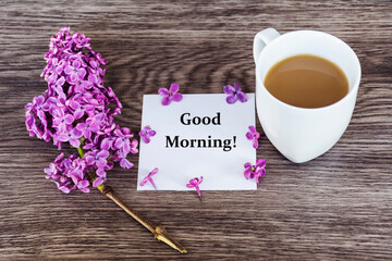 Cup of Coffee for  Good Morning and Purple Lilac .Top view 