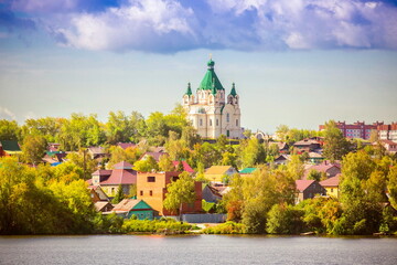 Temple of Alexander Nevsky on the panorama of the city of Nizhny Tagil on a summer day