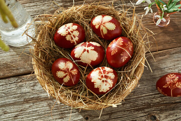 Easter eggs dyed with onion peels with imprints of leaves and plants