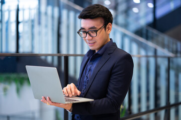 Portrait of young Asian businessman