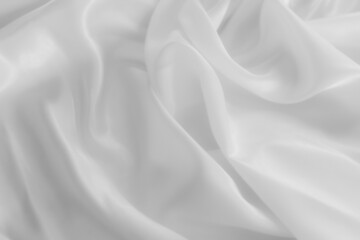 Fototapeta na wymiar White cloth background abstract with soft waves, closeup texture of cloth