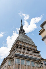 Fototapeta na wymiar details of the Mole Antonelliana towering on the city di Torino