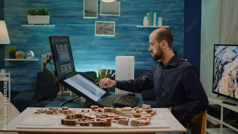 Poster architect analyzing building model on touch screen monitor for construction layout in architectural 