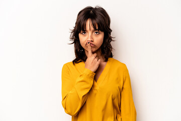 Young hispanic woman isolated on white background thinking and looking up, being reflective, contemplating, having a fantasy.