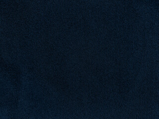 Fototapeta na wymiar Dark blue velvet fabric texture used as background. Empty dark blue fabric background of soft and smooth textile material. There is space for text..