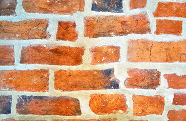 Obraz premium Close up of red aged brick wall as abstract background texture with old and vintage style pattern.