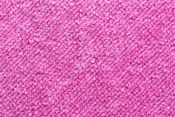 Pink terry towel, background, close-up. Handmade, textile
