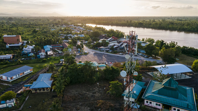 Aerial View Of 4g And 5g Cellular Telecommunication Towers At Rural Area With Landscape Scenery