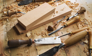 Woodworker. Timber, wood processing. Joinery work. Wood carving with work tools close up. Hand of...