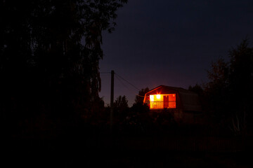 an old house in a private village building in ukraine, against the backdrop of a calm, quiet sky without war