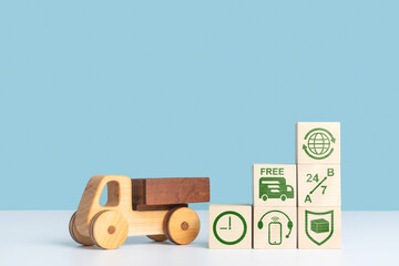 The concept of a delivery and logistics service. A wooden truck stands at the cubes with information icons.