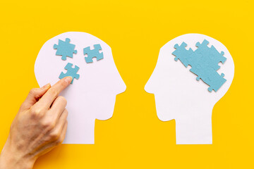 Human communication concept with two paper human heads