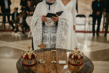 Pair of golden crowns n the church. Orthodox religious crowns.