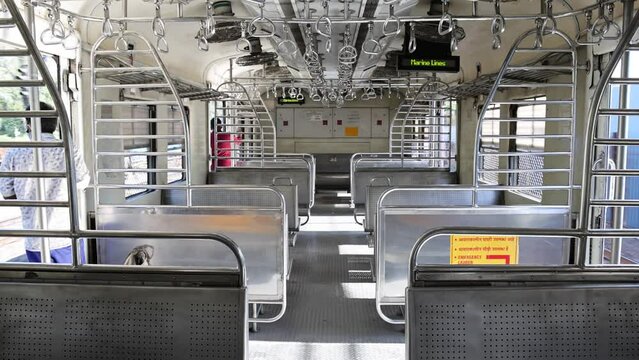 Real Time Video of the interior of a fairly empty compartment of a Mumbai local train during Coronavirus Covid19 Pandemic. Inside of an Indian Railways local train in Bombay, Maharashtra, India. 4816.