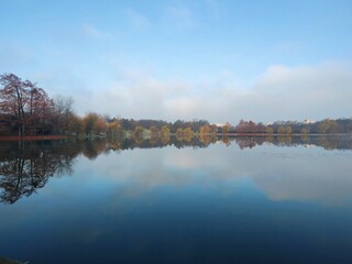 Fototapeta na wymiar Misty morning on the lake - autumn morning