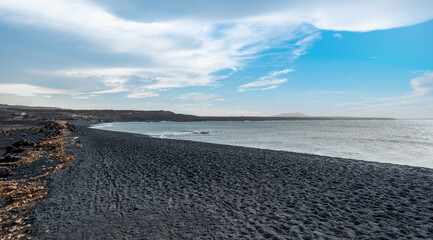 Black volcanic sand beach, Janubio Beach, Lanzarote, Canary Islands, Spain