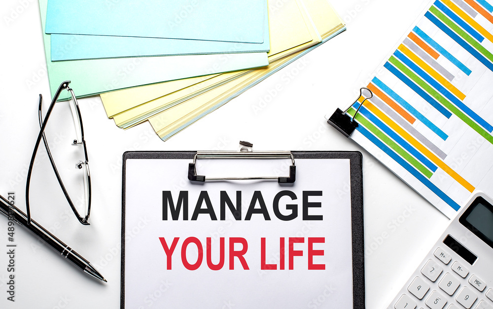 Poster manage your life text on paper sheet with chart,color paper and calculator