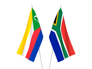 National fabric flags of Republic of South Africa and Union of the Comoros isolated on white background. 3d rendering illustration.