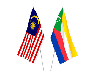 National fabric flags of Malaysia and Union of the Comoros isolated on white background. 3d rendering illustration.