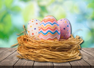 Stylish Easter eggs on rustic background. Happy Easter! Natural dyed colorful eggs