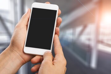 Man hands using smart phone with a blank screen