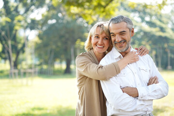 Portrait of happy elderly couple hug together take care and love with good relationship good health...