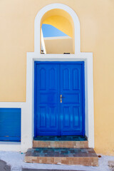 Blue and white front door in Santorini, Greece
