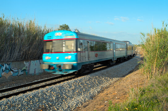 Portuguese train passing by Olhao, Algarve, Portugal