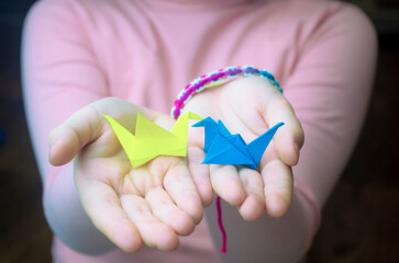 a crane made of paper, a symbol of peacehand made