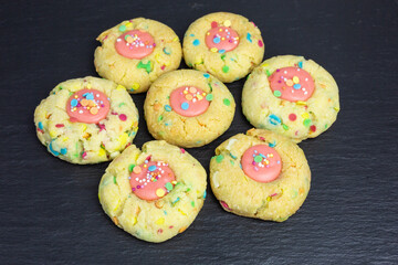 thumbprint cookies filled with chocolate ganache and sugar sprinkles - 489907858