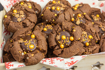 thumbprint chocolate cookies with golden sprinkles - 489907865