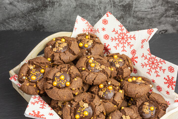 thumbprint chocolate cookies with golden sprinkles - 489907866