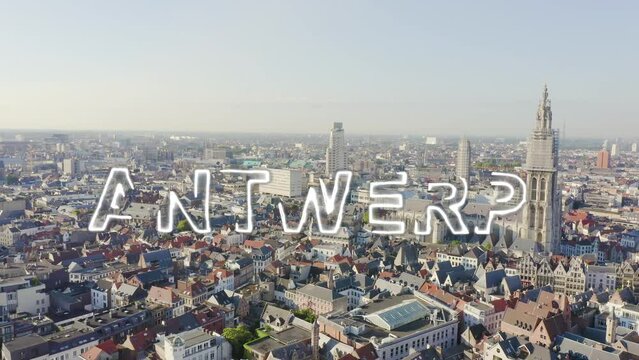 Inscription on video. Antwerp, Belgium. Cathedral of Our Lady of Antwerp. (Onze-Lieve-Vrouwekathedraal Antwerpen). Neon white effect text, Aerial View