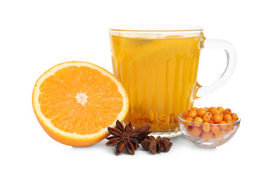 Glass cup of immunity boosting drink and ingredients on white background
