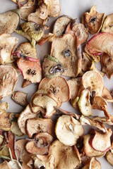 Dried apples on vintage style. Food background.