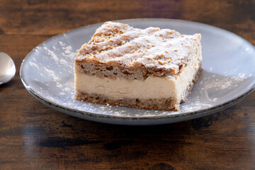cream and hazelnut cake on a plate