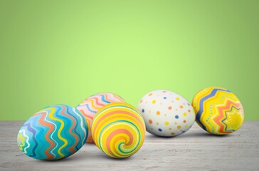 Stylish Easter eggs on rustic background. Happy Easter! Natural dyed colorful eggs