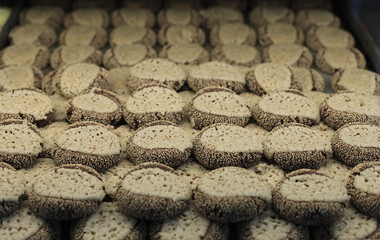 A cookie is a baked or cooked snack or dessert that is typically small, flat, and sweet. 