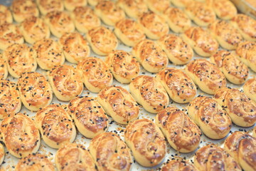 A cookie is a baked or cooked snack or dessert that is typically small, flat, and sweet. 