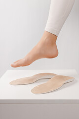Medical insoles. Isolated orthopedic insoles on a white background. Treatment and prevention of...