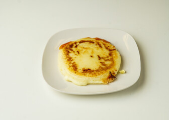 Arepa on a white plate