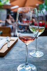 summer terrace with glasses of wine