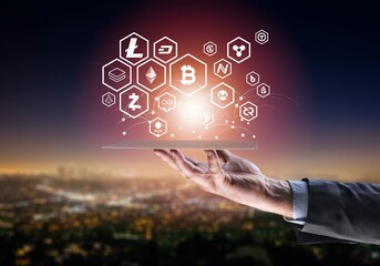 Business person holding smartphone and showing virtual hologram of growth statistics, graphs and...