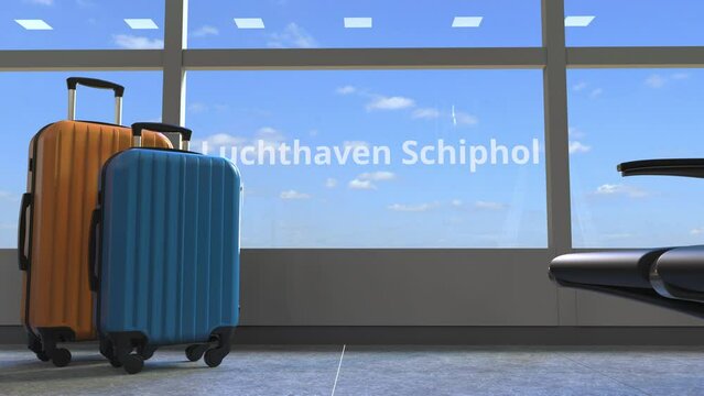 Terminal and commercial airplane revealing Luchthaven schiphol text