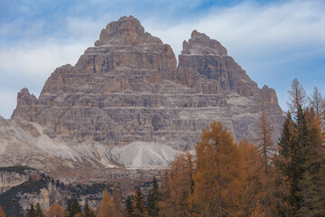 Seasonal autumnal scenery in Dolomites. Detail of Tre Cime di Lavaredo southern side. Popular travel destination in autumn